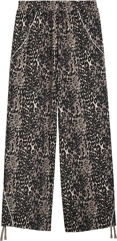 PUMA W SPORT ANIMAL RELAXED AOPWIDE LEG WOVEN PANTS på