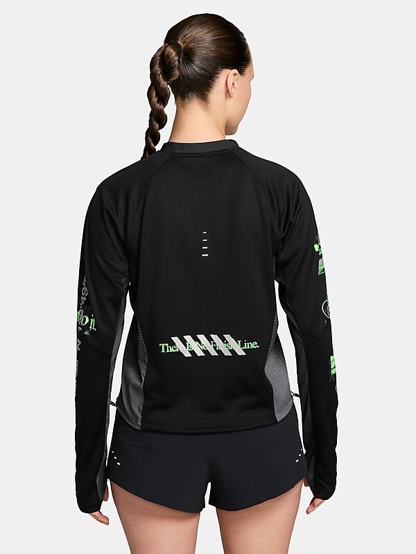 NIKE W NK SWIFT JERSEY TOP LS NV på