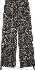 PUMA W SPORT ANIMAL RELAXED AOPWIDE LEG WOVEN PANTS på