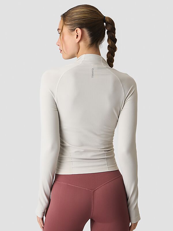 ICANIWILL DEFINE SEAMLESS INVISIBLE 1/2 ZIP LS W på