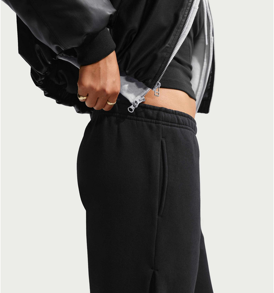 NIKE Women's Loose Pleated Press-stud Trousers Studio Fleece Medium Weight på